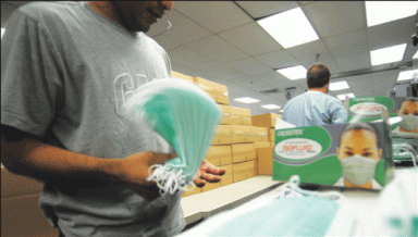 Mask mass production revs up with swine flu fears 13 mask-2009-05-05_z