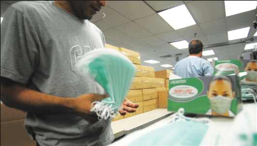 Mask mass production revs up with swine flu fears 1 mask-2009-05-05_z