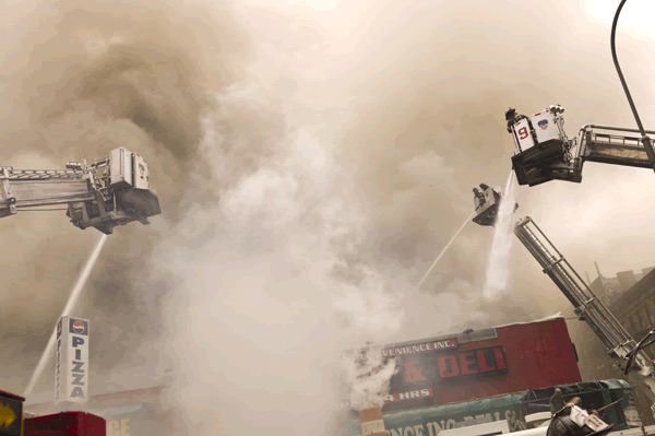 Fire rages through 14th St. retail strip 1 petes-2009-05-25_z