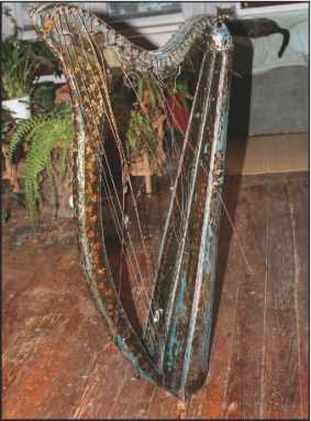 Rescued from trash, ancient harp will trill again 1 harp-2009-07-28_z