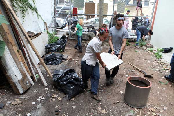 Photos by Tequila Minsky From left, Jefferson Market Garden volunteers Ro McIntyre, Judy Cohen, Alexis and Jane Osmers were on hand last Sunday to greet visitors.