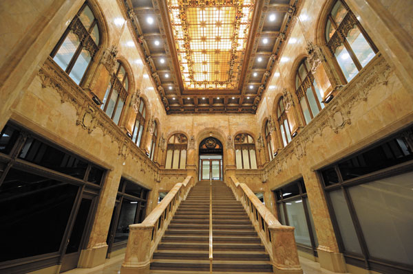 Skyscraper Museum celebrates Woolworth’s 100th birthday 3 Downtown Express photos by Terese Loeb Kreuzer The lobby of the Woolworth building at 233 Broadway. The stairs once led to the Irving Bank, which occupied several floors of the building when it opened in April 1913. Corbels in the lobby of the Woolworth building depict the men who played a role in creating it. Architect Cass Gilbert is shown holding a model of the building, near right, and Frank Woolworth, who hired him.