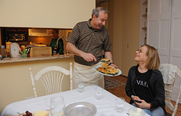 Covering B.P.C., March 21, 2013 1 Gus Oranitsas, resident manager of Liberty Court and a TimeBank member, with Donna Rothkopf and a plate of spanakotiropita — spinach and feta cheese pie — that he showed TimeBank's "foodie" club how to make. Downtown Express photo by Terese Loeb Kreuzer.