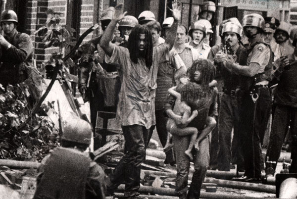 MOVE Documentary is Well Done, Moving 2 In a 1978 confrontation, MOVE members and children emerge from their “headquarters.” Photo by Sam Psoras