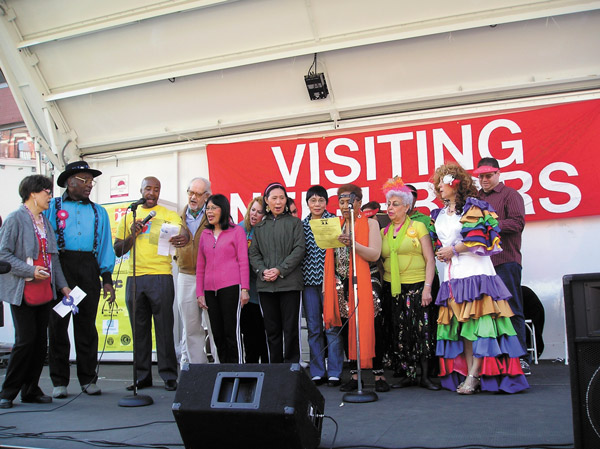 At Visiting Neighbors Street Fair, Talent is Ageless 3 The gang’s all here: performers gather on stage for the grand finale.