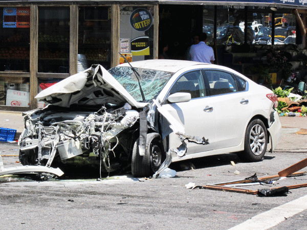Drag-racing driver careens onto sidewalk, injuring 4 3 Photos by Lincoln Anderson