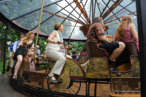 A bicycle carousel at Fete Paradiso on Governors Island this summer dates from 1897. At the time, bicycles were a novelty and many people were afraid to ride them. Carousels of this type allowed them to get accustomed to this new mode of transportation. (Photo: Terese Loeb Kreuzer)