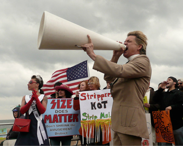 ‘Zipper’ stops short at exposing the whole story 2 Photos by Amy Nicholson Megaphone in hand, Rev. Billy lends his voice to the protest.