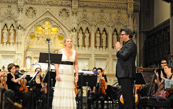 Trinity's 4-month marathon celebrating Britten, renowned composer & gay pioneer 3 Conductor Julian Wachner applauding mezzo-soprano Virginia Warnken for her performance of Benjamin Britten's "Phaedra" at Trinity Church on Sept. 5. Downtown Express photo by Terese Loeb Kreuzer.