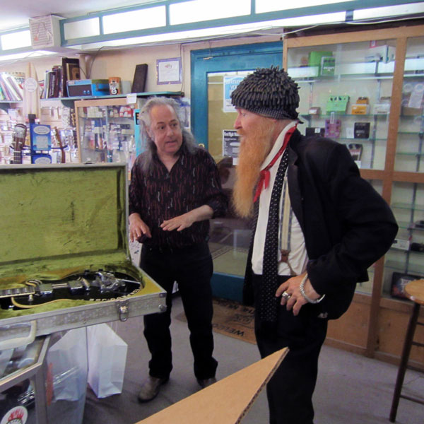 A good guitar is a work of art 2 Photo by Shira Goldberg First Flight owner Danny Wollock, with ZZ Top’s Billy Gibbons.