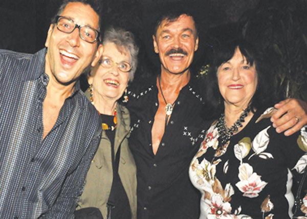 Photo by Maria Esteves From left, Will Grega, his mother-in-law Elaine Jones, Randy Jones and his mother-in-law Marge Robbins at Grega and Jones’s wedding fete. 