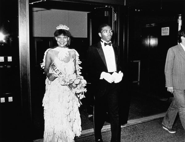 A ‘Radical Presence’ to be Reckoned With 3 Lorraine O’Grady: Untitled (Mlle. Bourgeoise Noire and her Master of Ceremonies enter the New Museum). 1980-83, printed 2009. Gelatin silver print. 7 1/4 x 9 1/4 in. IMAGE COURTESY THE ARTIST AND ALEXANDER GRAY ASSOCIATES, NY