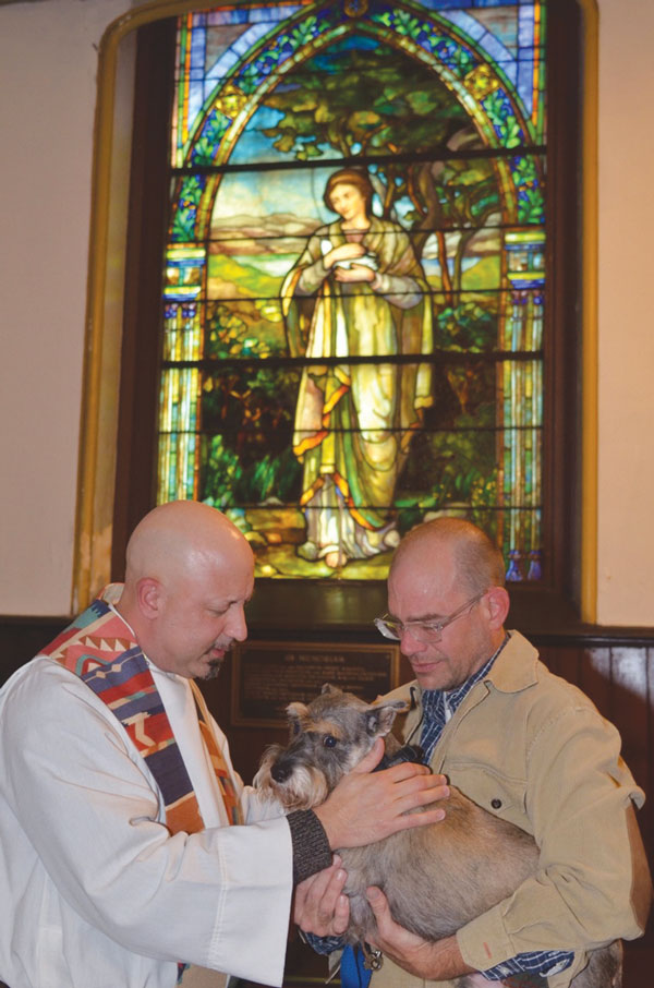 Community Activities, Week of Oct. 9, 2013 2 Photo by Chris Kreussling Rev. John Magisano, pastoral counselor for Chelsea Community Church, at 2012’s Blessing of Animals.
