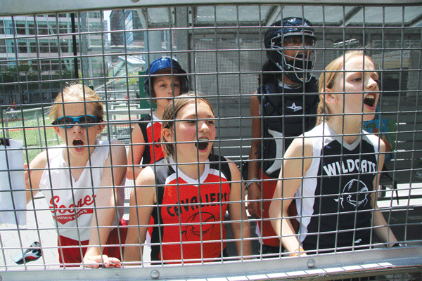 Downtown All-Stars are too much, bury Furies, 11-6 2 The Downtown All-Stars — here cheering on a teammate at bat — definitely came to play. Photos by Tequila Minsky