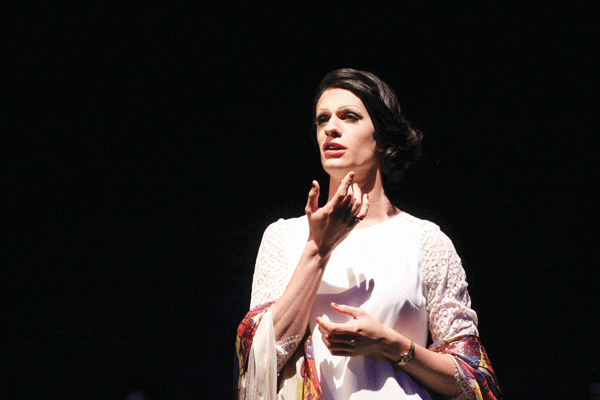 Mykel Vaughn, as Madam Sparrow, towers over her enemies (and not just because of the high heels).  Photo by Lloyd Mulvey 