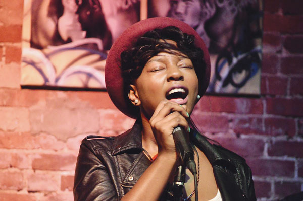 An “All That!” participant trying out a new song.   Photo by Lynn Cappiello