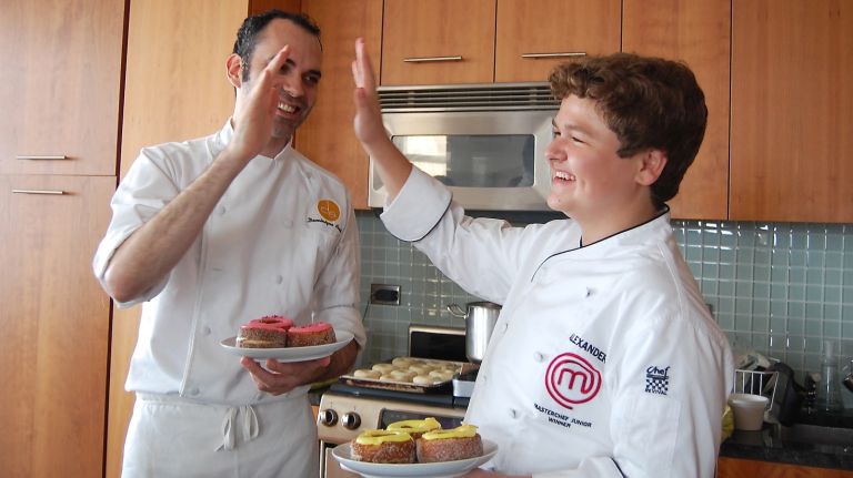 Dominique Ansel teaches MasterChef Junior winner Alexander Weiss to make Cronuts 1 ansel, weiss high five amny cropped