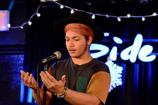 Slammin’ at the Sidewalk Cafe 1 Gabriel, competing in a Slam at Sidewalk Cafe. Photo by LYNN CAPPIELLO