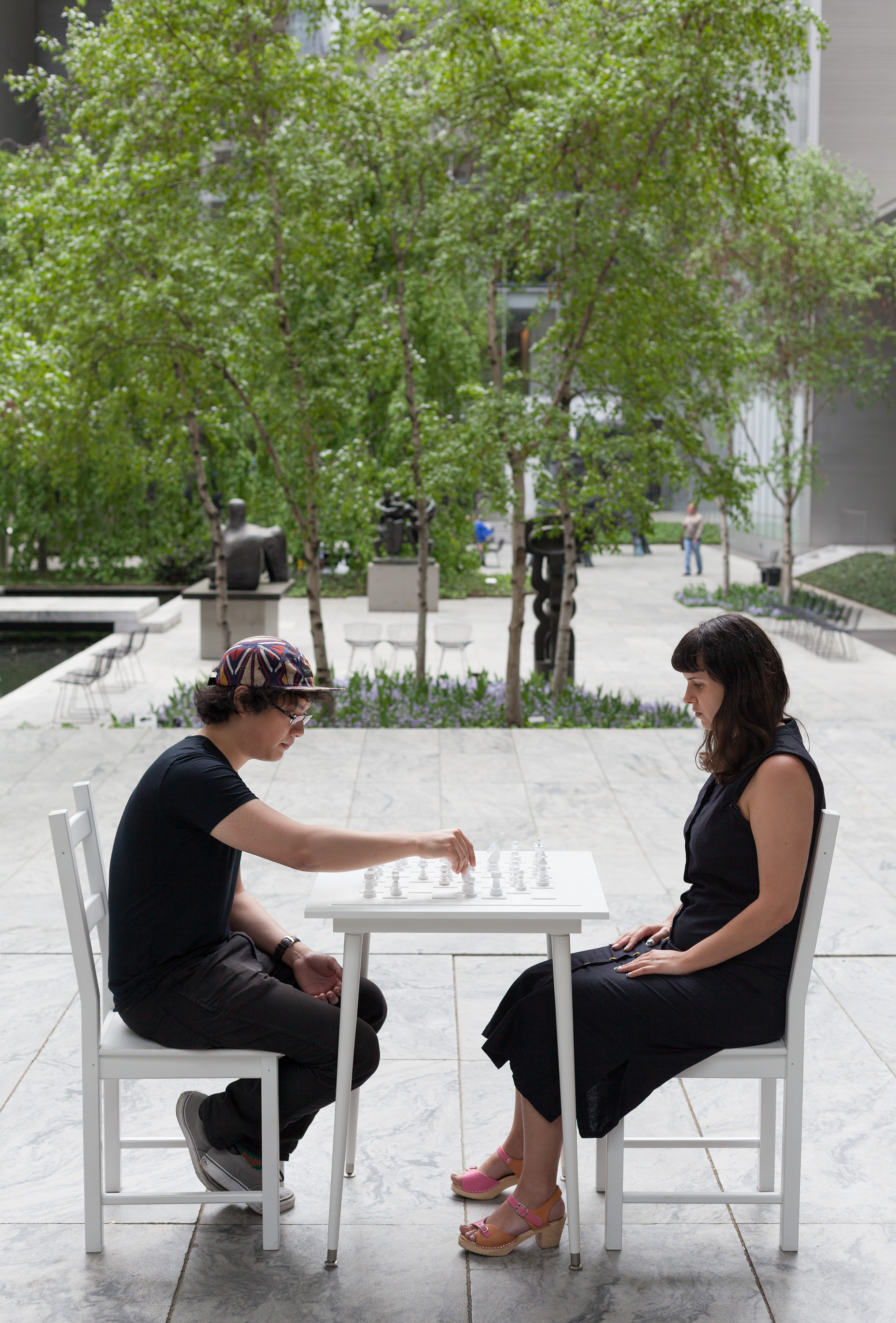 Buhmann on Art: Yoko Ono at MoMA 4 Yoko Ono’s “White Chess Set” (1966) in the Abby Aldrich Rockefeller Sculpture Garden, presented in conjunction with the exhibit. Photo by Thomas Griesel © 2015 The Museum of Modern Art.