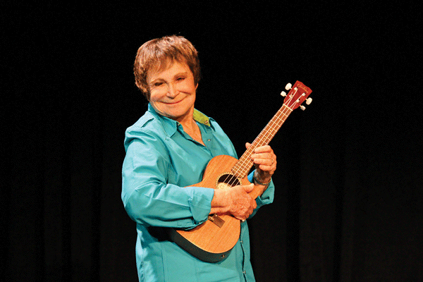Singing and strumming, surviving breast cancer 1 Ukulele lady D’yan Forest didn’t let a morning radiation treatment stop her from driving to a gig on Staten Island. Photo by Stephen Greving