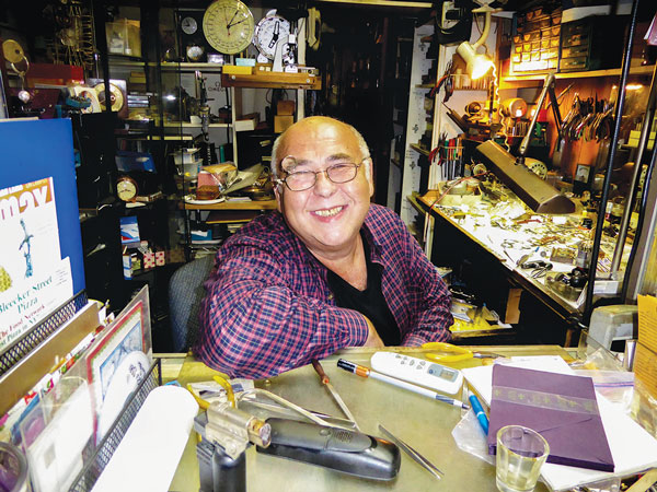 A stitch in time on W. 10th St. 3 Walter DikaArev keeps things ticking. Photo by Toni Dalton