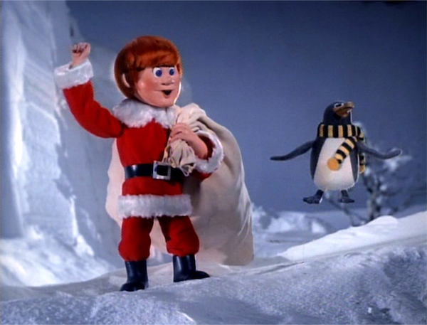 Who is Santa? 2 A geographically misplaced penguin sidekick isn’t the only fishy thing in 1970’s “Santa Claus Is Comin’ to Town.” Photo: Rankin-Bass, Exploretalent.com.