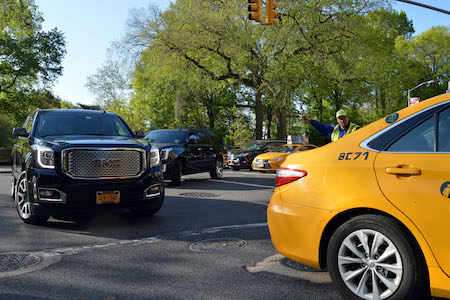 Traffic turning left onto West 93rd Street from Central Park West. | JACKSON CHEN 