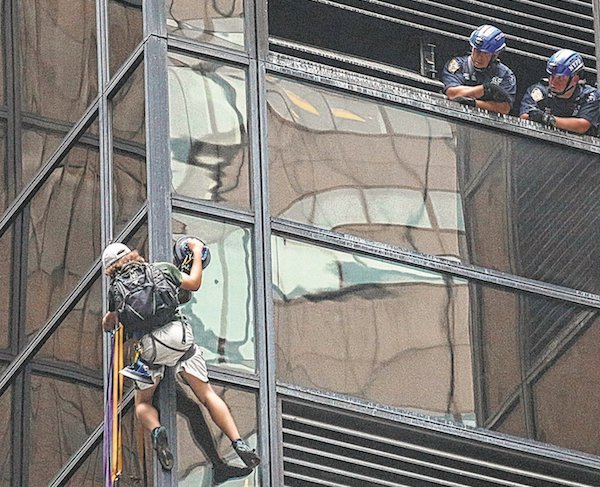 After Yuge Gamble, Intrepid Trumpie Ends Up in Bellevue 1 Stephen Rogata, at around the eighth floor of Trump Tower, turns the corner from an east-facing wall to a south-facing one after police cut through ventilation grates above him. | JEFFERSON SIEGEL