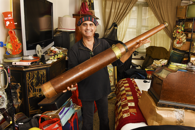He’s not lost in the museum, but living in it! 3 Denny Daniel with an enormous telescope in his bedroom.