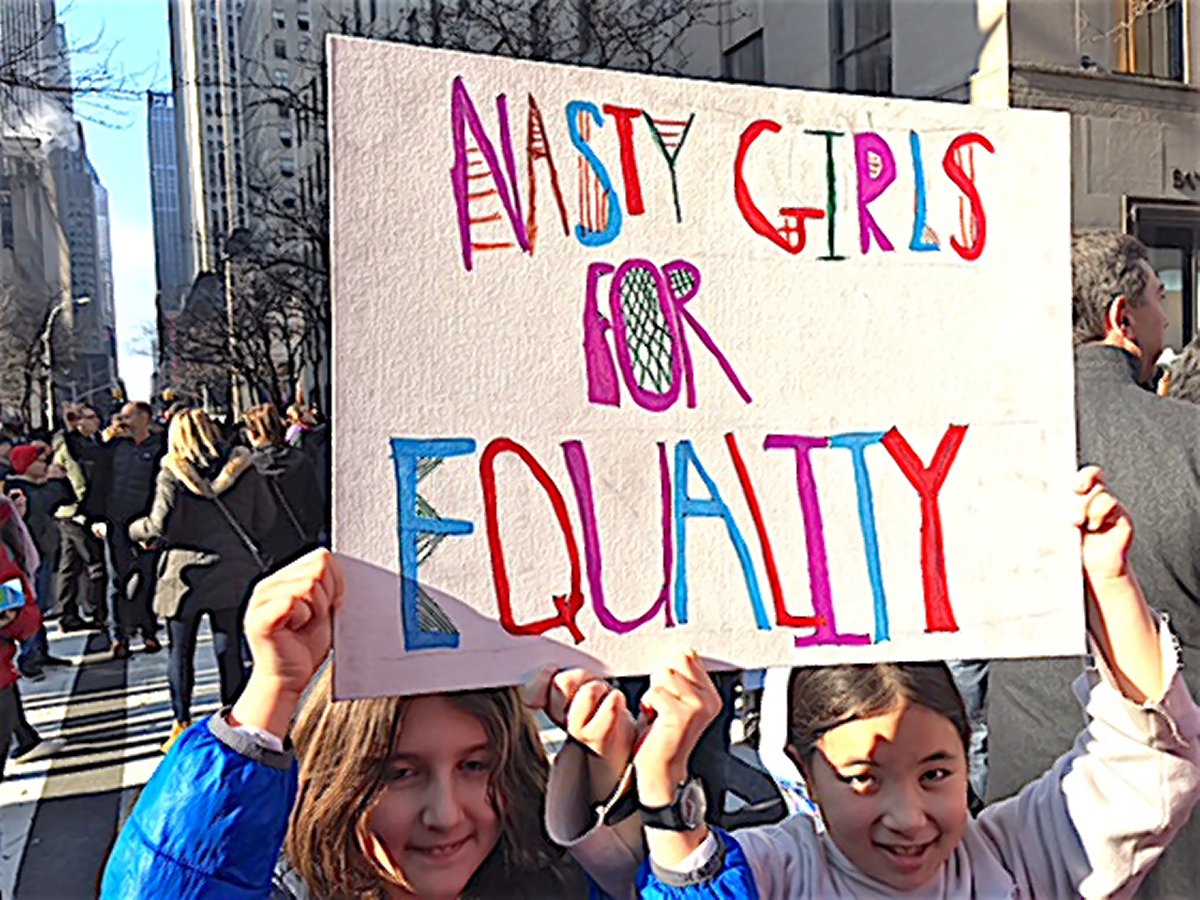 Hanako Gibersztajn, the writer’s daughter, right, and her friend Sarah Mehl at the Women’s March in New York City.  Photo by Yukie Ohta