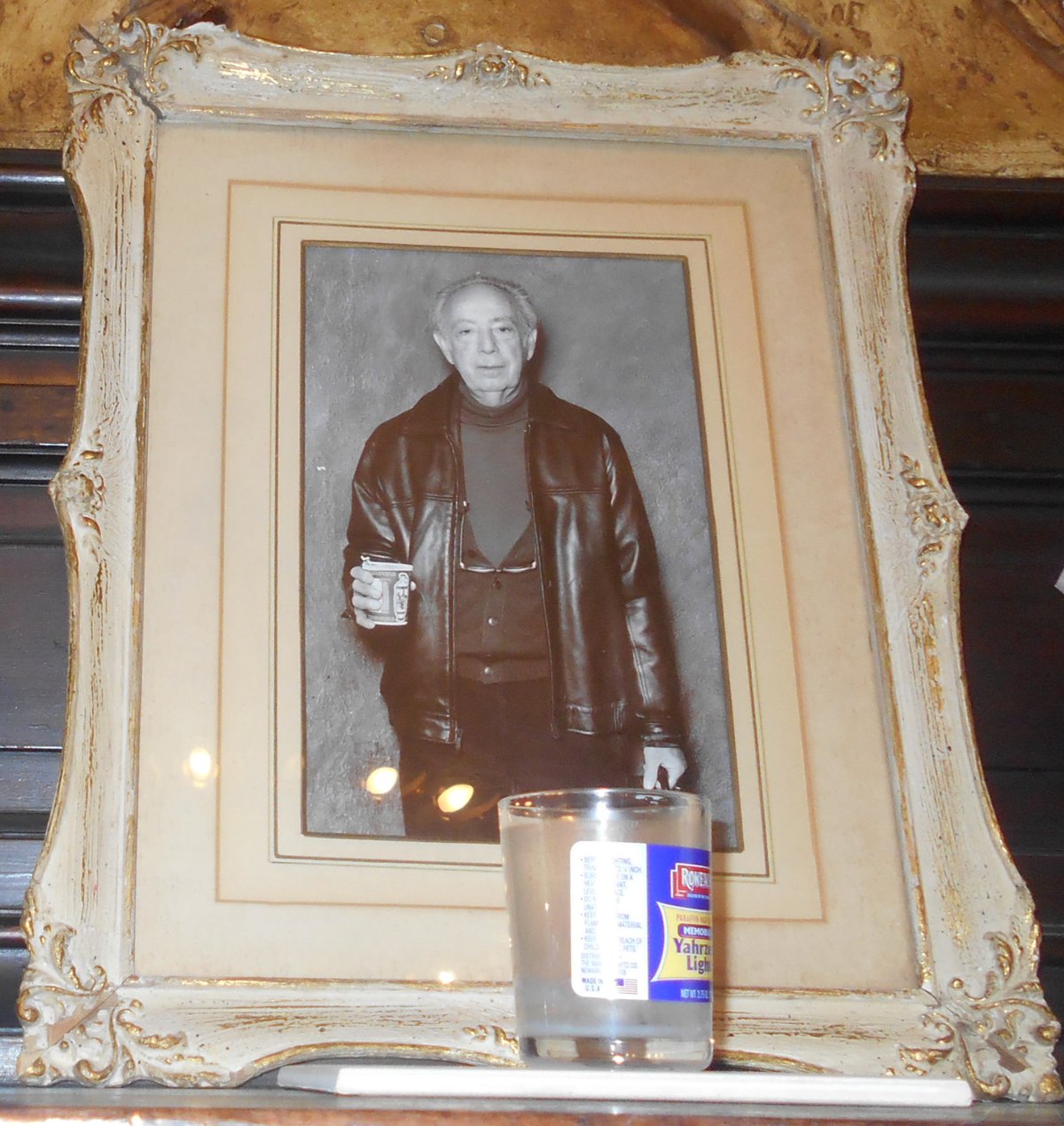 Hotel Chelsea work drags on, as long-term tenants hold on 2 A photo of Stanley Bard, The Chelsea Hotel’s former owner, and memorial candle that were left atop the hotel lobby’s fireplace after he died
