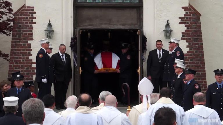 Thousands of mourners pay final repects to fallen firefighter William Tolley