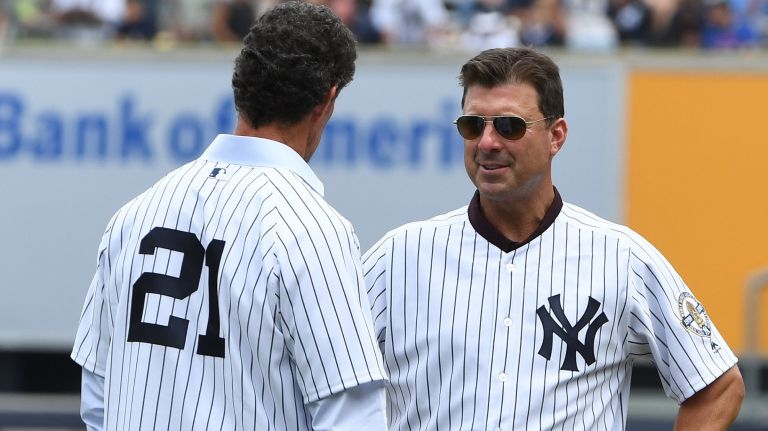 Paul O'Neill, left, and Tino Martinez