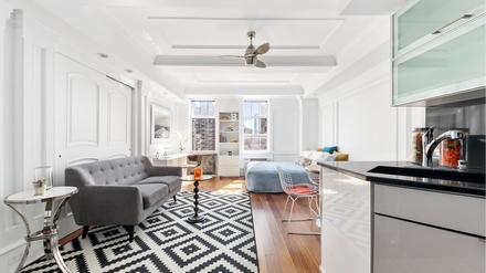 views and vintage paneled walls come with this alcove studio