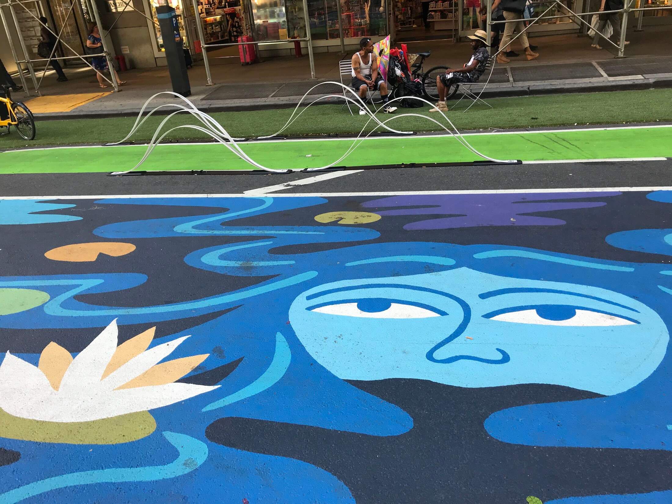 Takin' it to the (car-free) street: Mural enlivens Broadway 2