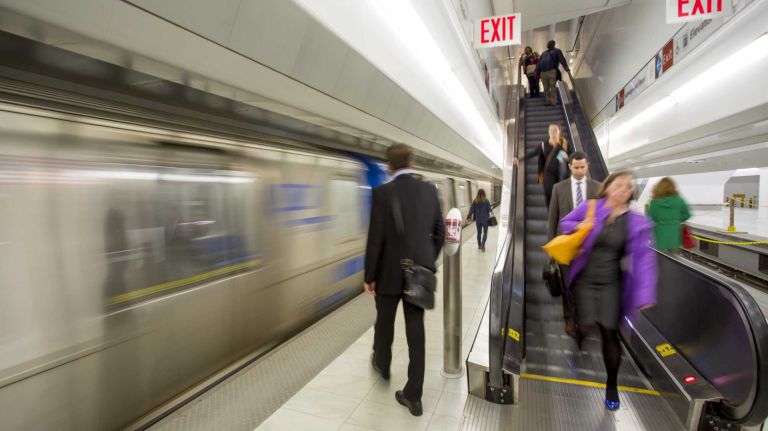 Commuters wait for a Hoboken-bound PATH train at the World Trade Center Transportation Hub in Manhattan on May 6, 2015.