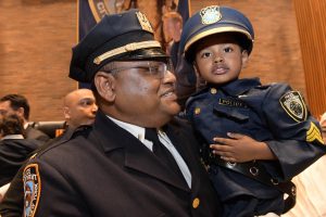 NYPD promotes cops at Police Plaza ceremony 3 Lt. Karam Chowdhury with his son