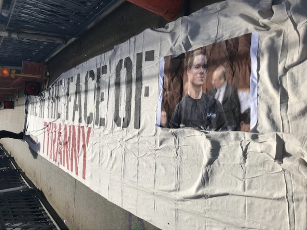 Cuomo has tough words for Proud Boys after group vandalizes city with banners 2