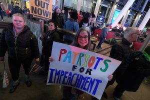 Dueling protestors at MSG as Prez Trump attends wrestling match 5