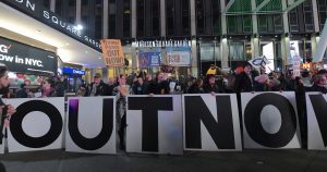 Dueling protestors at MSG as Prez Trump attends wrestling match 6