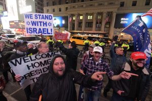Dueling protestors at MSG as Prez Trump attends wrestling match 4