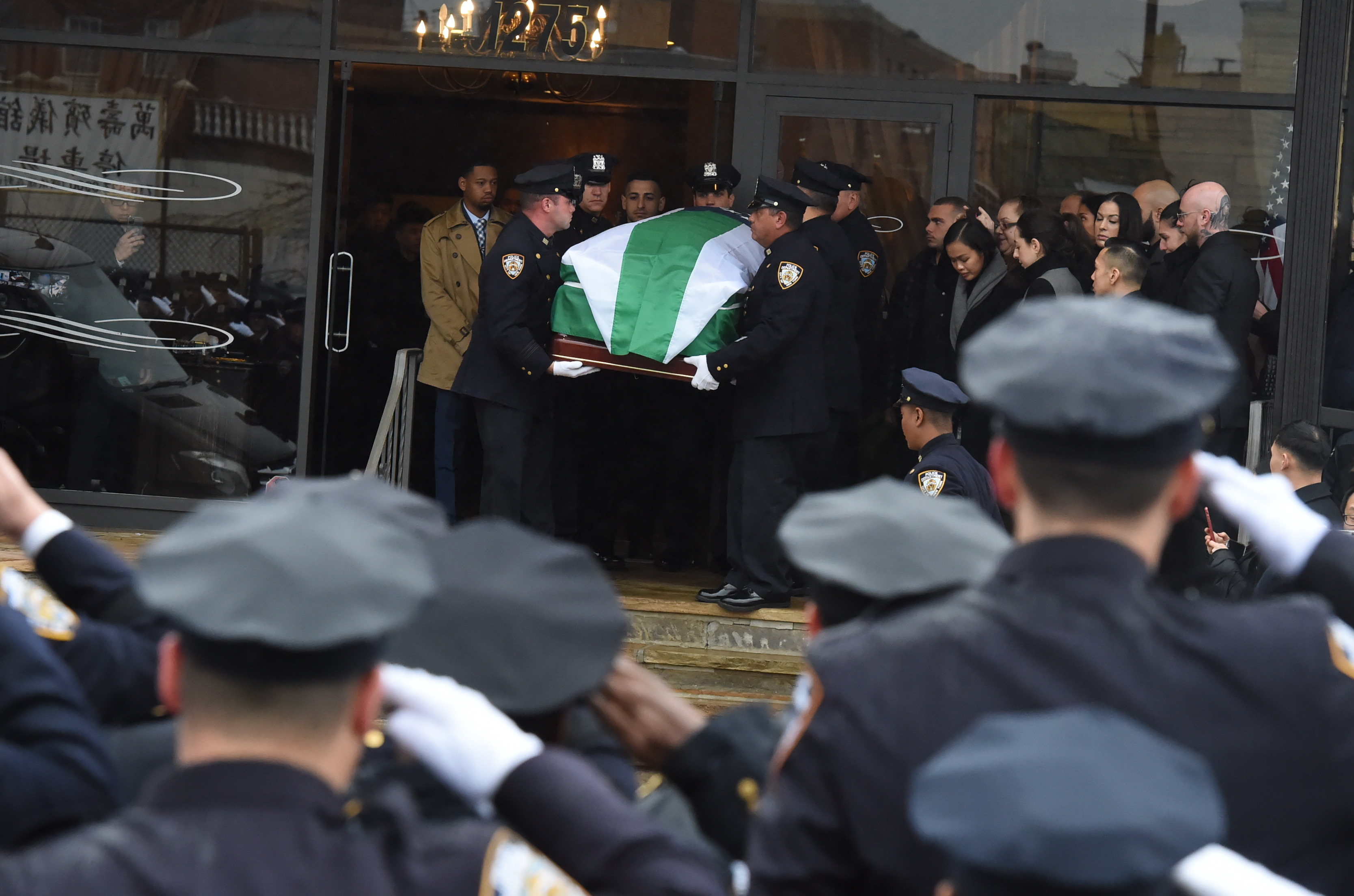 olice Officers salute Officer Garman Chen killed in crash last week