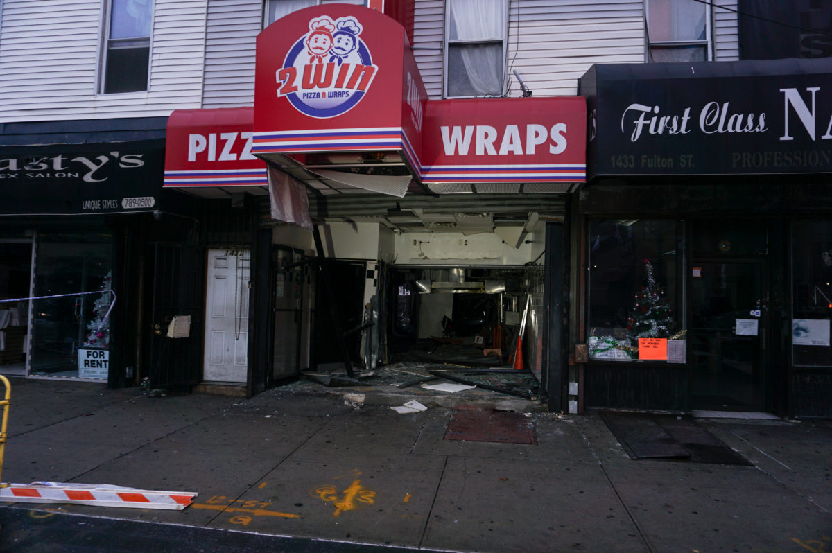 A car crashed into a pizza shop at 1431 Fulton Street in Bedford