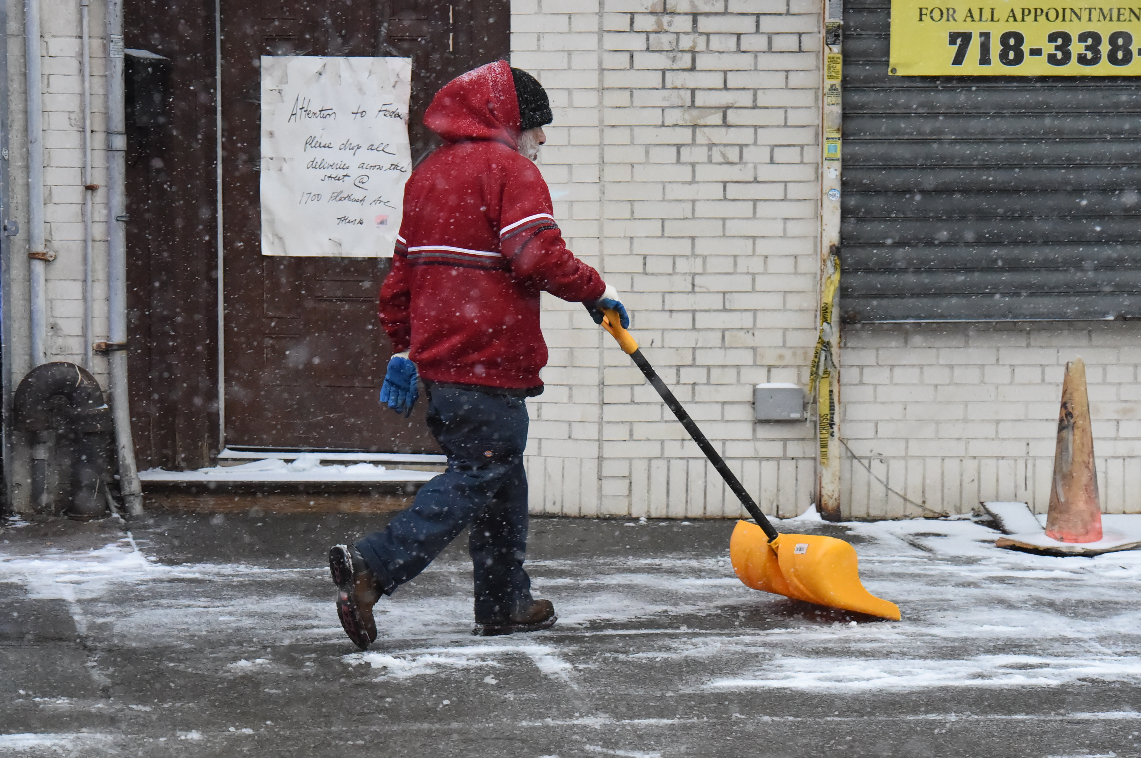 Slick snowstorm taken in stride (and with sledding) across Brooklyn 3