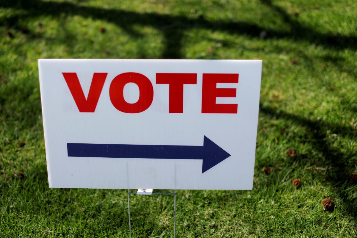 FILE PHOTO: A Vote sign directs voters to an early polling station for the March 3 Super Tuesday primary in Santa Ana California