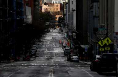 A mostly empty Western Avenue near Pike Place Market during the coronavirus disease (COVID-19) outbreak in Seattle