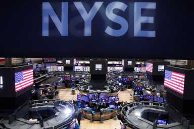 The floor of the New York Stock Exchange (NYSE) stands empty as the building prepares to close indefinitely due to the coronavirus disease (COVID-19) outbreak in New York