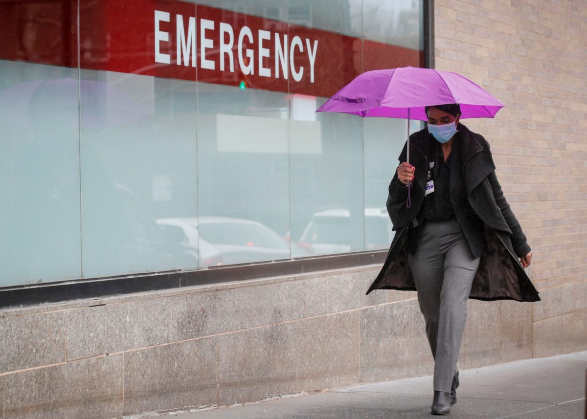A Healthcare worker arrives at Mount Sinai Hospital, during the outbreak coronavirus disease (COVID-19)  outbreak, in New York