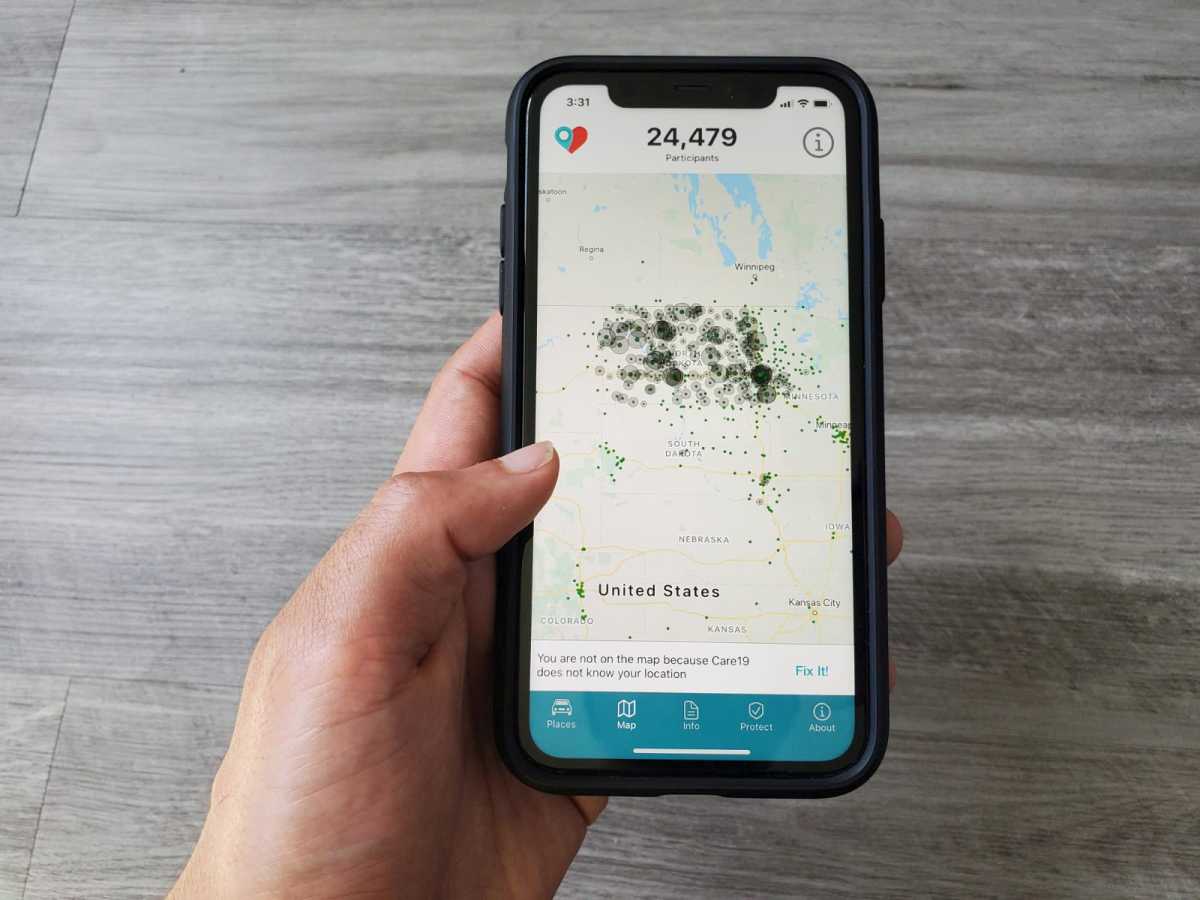 FILE PHOTO: The Care19 mobile app, which the governors of North Dakota and South Dakota have asked residents to download to assist in contact tracing during the global outbreak of the coronavirus disease (COVID-19), is seen on a phone