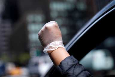 A driving caravan protest for immigrant workers rights in New York